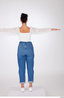 Suleika dressed high waist loose jeans standing t-pose white balloon…